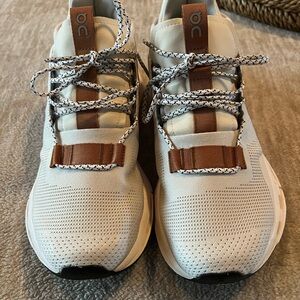 On Running Cream and Tan Athletic Shoes